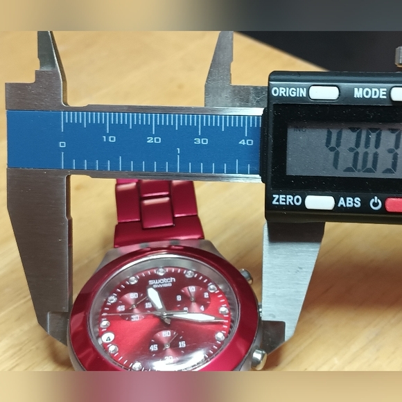 X Swatch Irony Diaphane Ruby red bezel and dial 3 hand movement date 43mm - Picture 7 of 9